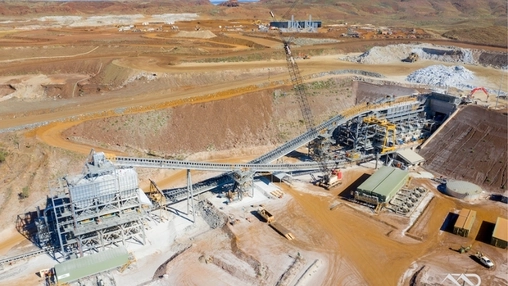 Aerial view of an open-pit lithium mining and processing site in Australia