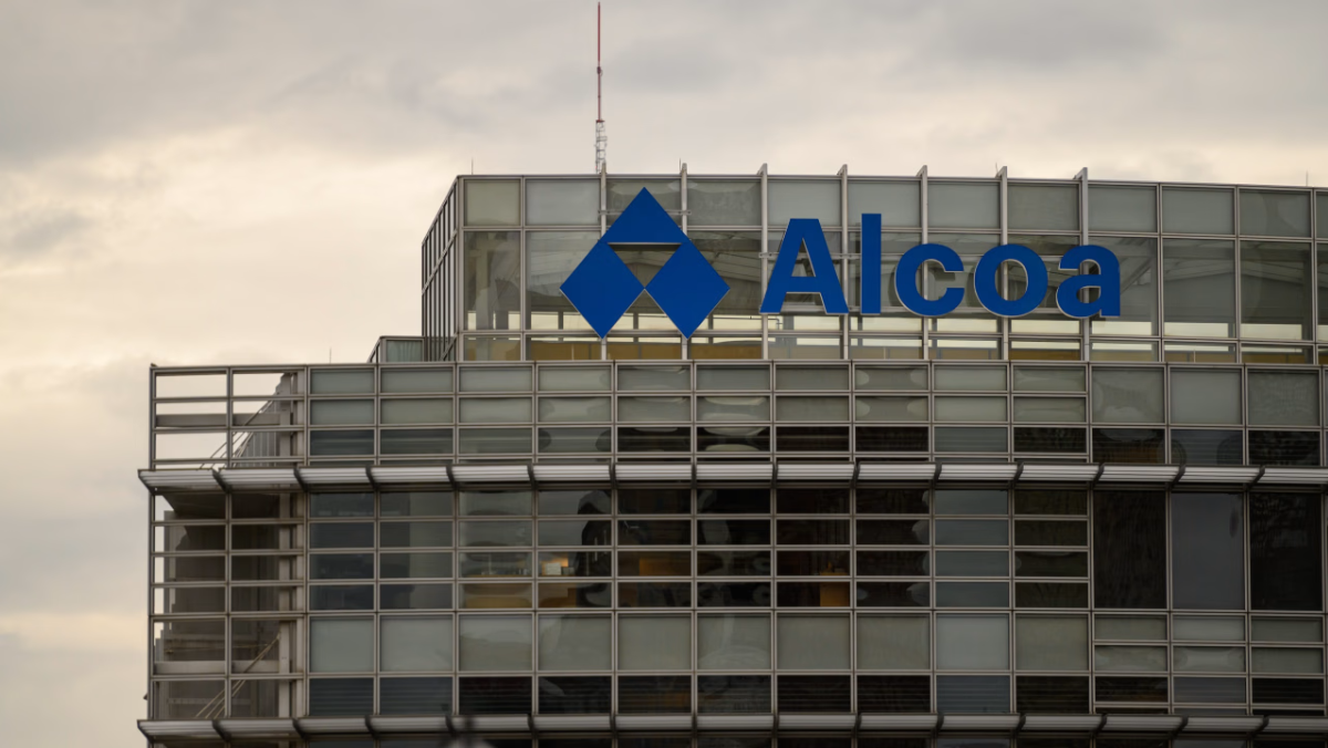 Alcoa logo on modern glass building linked to critical minerals projects
