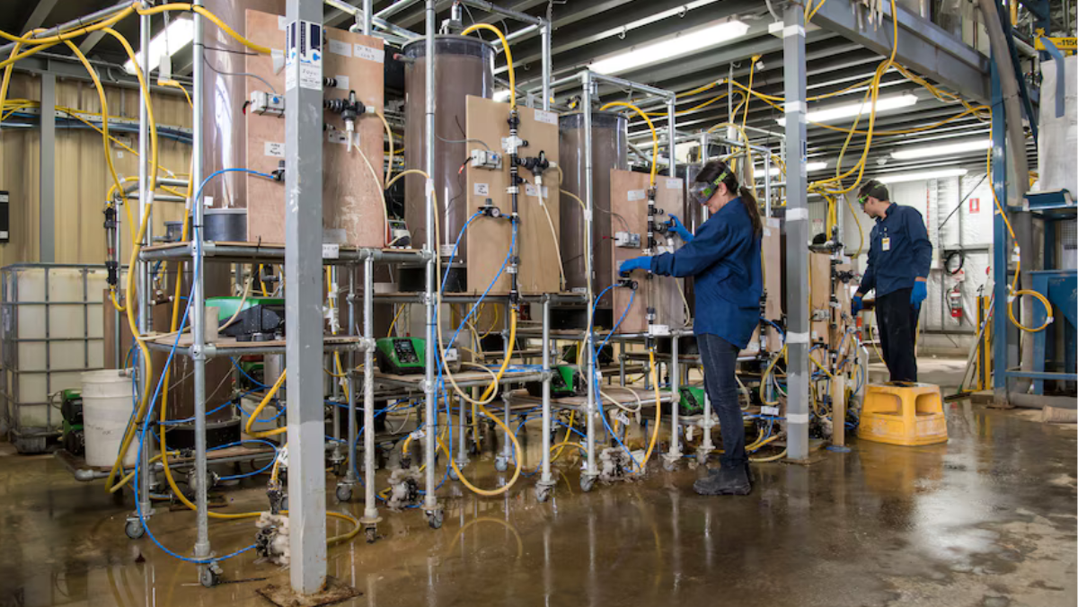 Technicians running rare earth pilot processing equipment at Australia’s new test facility.